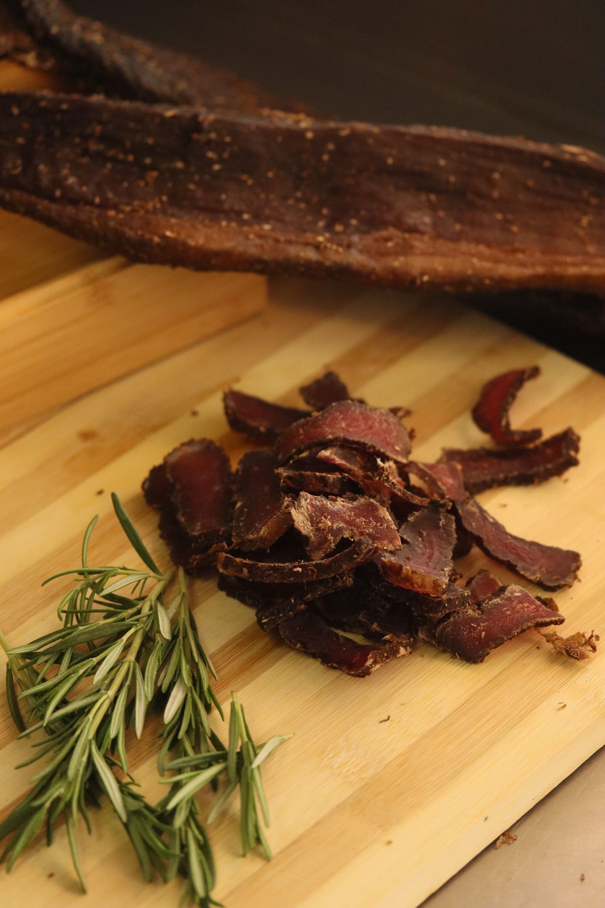 Dried beef jerky on a wooden board